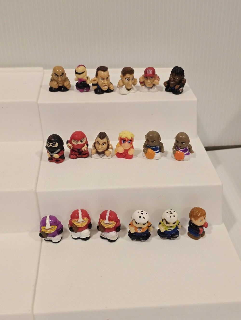 Squinkies Sports WWE Wrestlers, Football, Basketball and Ninja Figure Set